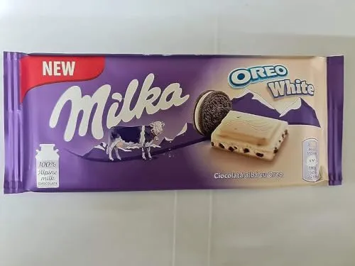 Milka Oreo White Chocolate Bar, 100g - Smooth Alpine Milk Chocolate with Crunchy Oreo Cookie Pieces